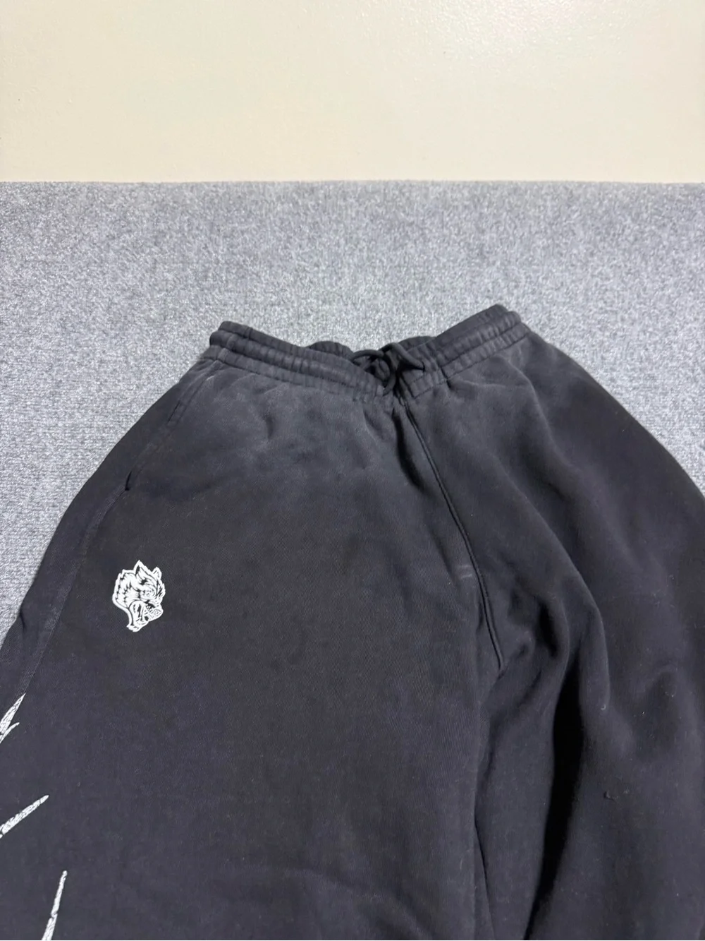 Men's Black Wide-Leg Sweatpants with Silver Tribal Side Graphics